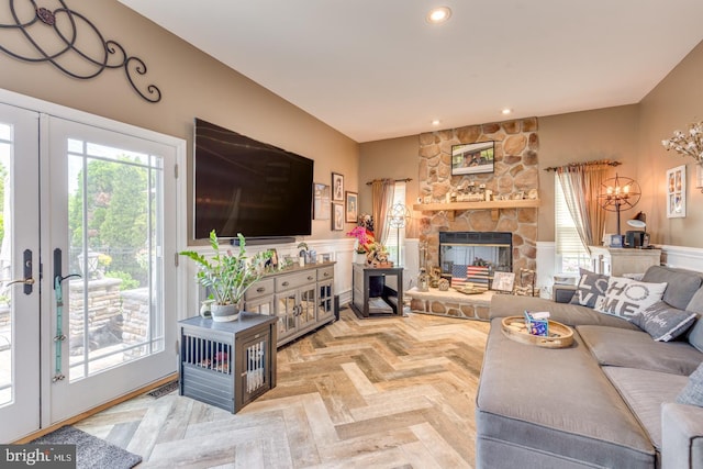 8 Adams Ln, Hainesport, NJ 08036 - living room with recessed lighting, a stone fireplace, and french doors