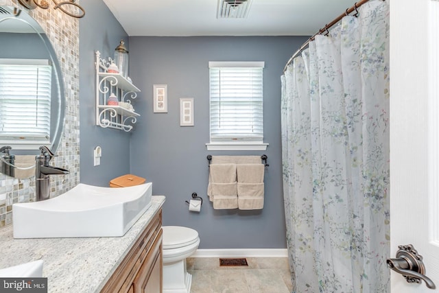 8 Adams Ln, Hainesport, NJ 08036 - full bath featuring vanity, toilet, baseboards, curtained shower, and tasteful backsplash