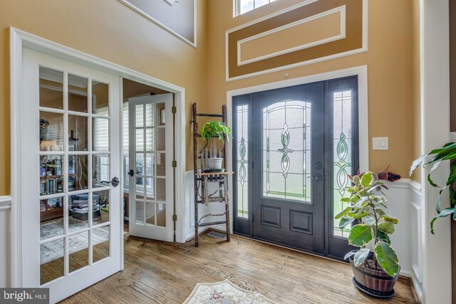 8 Adams Ln, Hainesport, NJ 08036 - foyer entrance with french doors, plenty of natural light, and wood finished floors