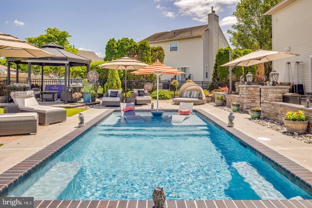 8 Adams Ln, Hainesport, NJ 08036 - view of pool with a gazebo, a fenced backyard, and a patio area