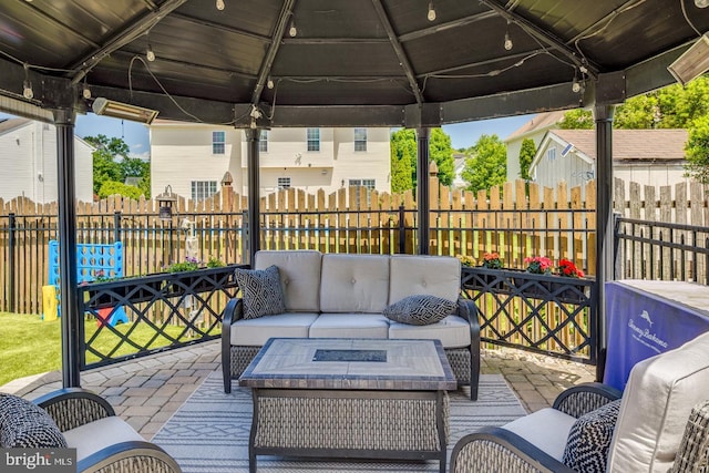 8 Adams Ln, Hainesport, NJ 08036 - fenced backyard with an outdoor living space with a fire pit, a patio, and a gazebo