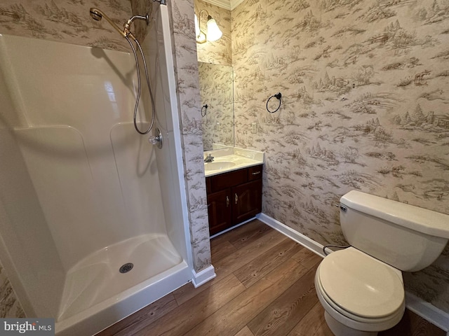 519 Orchard Dale Dr, Clear Brook, VA 22624 - full bathroom with wood finished floors, wallpapered walls, vanity, a shower stall, and baseboards