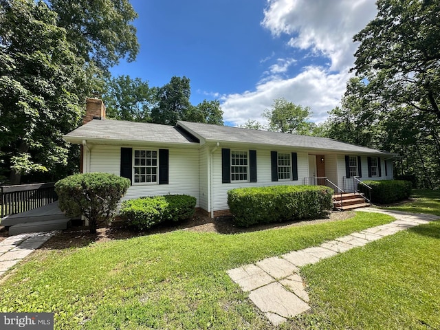 519 Orchard Dale Dr, Clear Brook, VA 22624 - single story home featuring a chimney and a front lawn