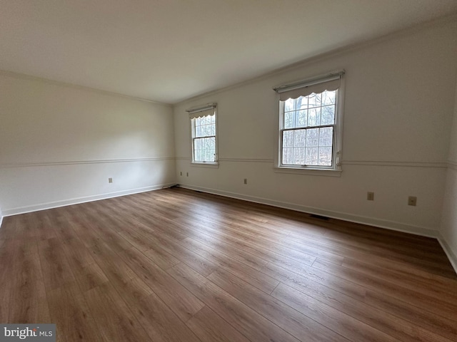 519 Orchard Dale Dr, Clear Brook, VA 22624 - unfurnished room featuring dark wood-style flooring, baseboards, and crown molding
