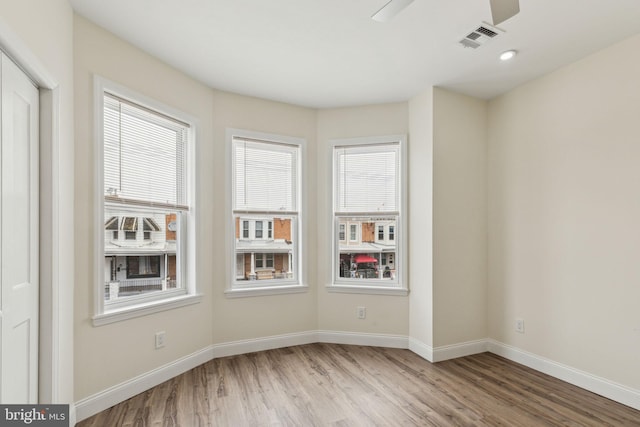 5724 Pine St, Philadelphia, PA 19143 - spare room featuring wood finished floors and baseboards