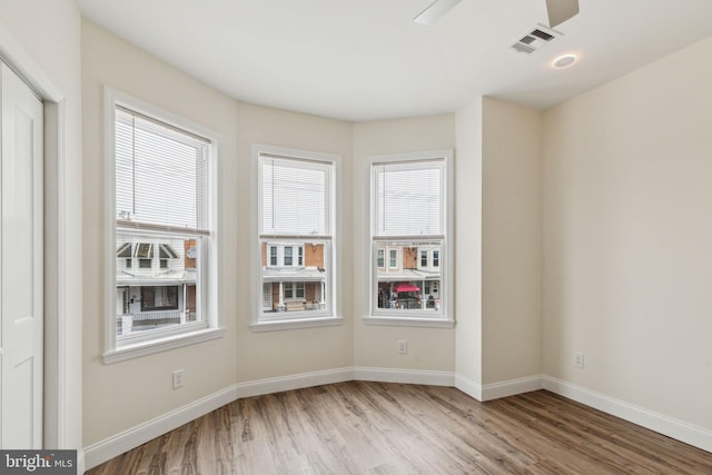 5724 Pine St, Philadelphia, PA 19143 - spare room with wood finished floors, baseboards, and a ceiling fan