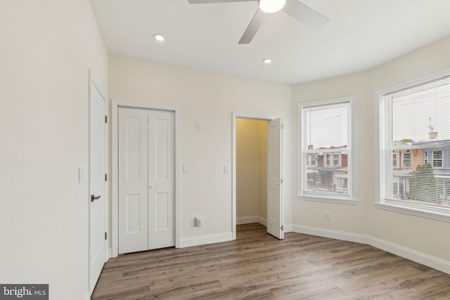 5724 Pine St, Philadelphia, PA 19143 - unfurnished bedroom featuring wood finished floors, baseboards, recessed lighting, and a ceiling fan