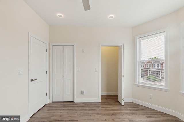 5724 Pine St, Philadelphia, PA 19143 - unfurnished bedroom featuring light wood-style floors, baseboards, ceiling fan, a closet, and recessed lighting