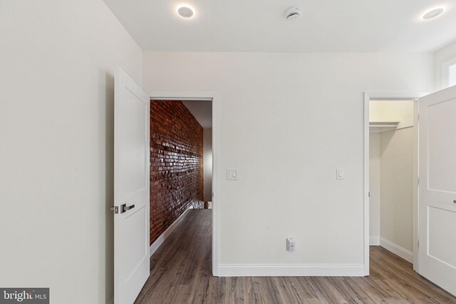 5724 Pine St, Philadelphia, PA 19143 - unfurnished bedroom with wood finished floors, baseboards, and a spacious closet