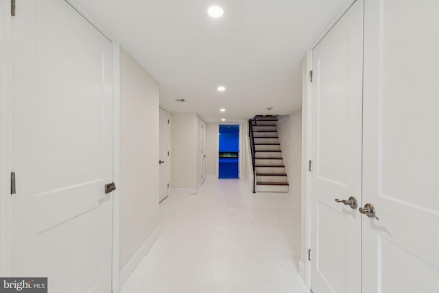 5724 Pine St, Philadelphia, PA 19143 - hallway featuring stairway, recessed lighting, finished concrete floors, and baseboards