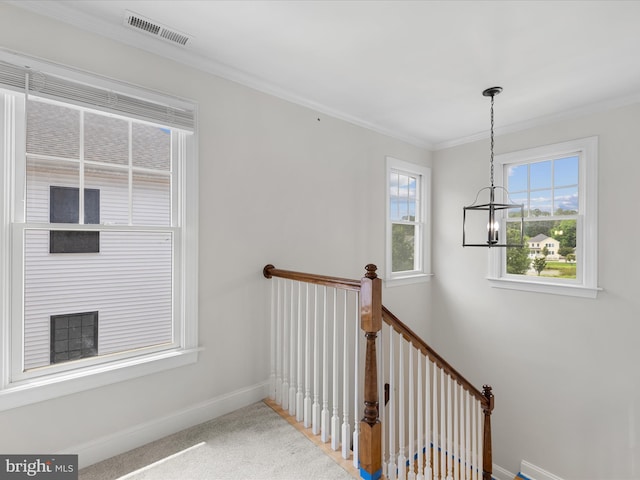138 Park Side Cir, Ocean Pines, MD 21811 - staircase with ornamental molding, a chandelier, and carpet