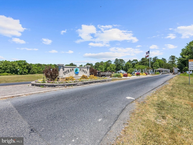 138 Park Side Cir, Ocean Pines, MD 21811 - view of asphalt street with curbs and traffic signs