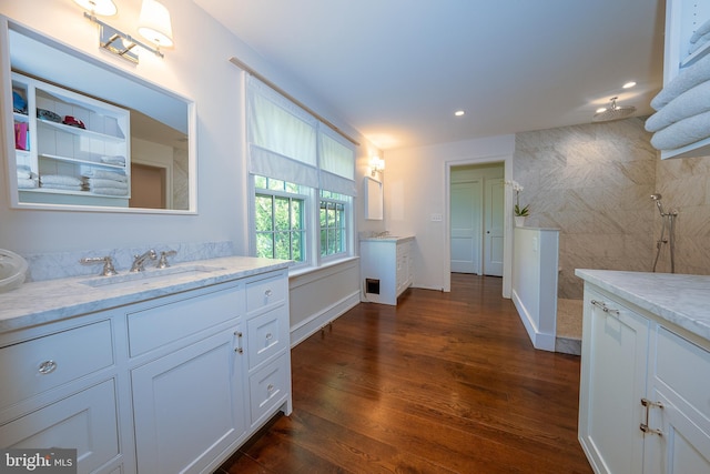 2 Earles Ln, Newtown Square, PA 19073 - bathroom with two vanities, wood finished floors, walk in shower, recessed lighting, and baseboards