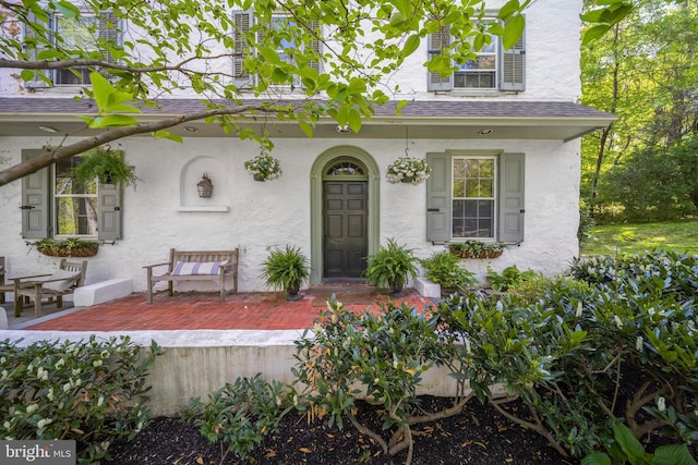 2 Earles Ln, Newtown Square, PA 19073 - entrance to property with stucco siding and roof with shingles