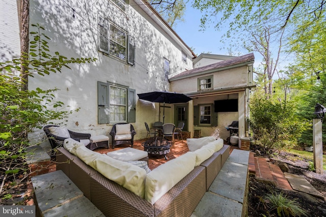 2 Earles Ln, Newtown Square, PA 19073 - rear view of house featuring an outdoor living space, stucco siding, a patio, and outdoor dining area