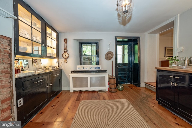 2 Earles Ln, Newtown Square, PA 19073 - bar featuring hardwood / wood-style flooring, radiator, and baseboards