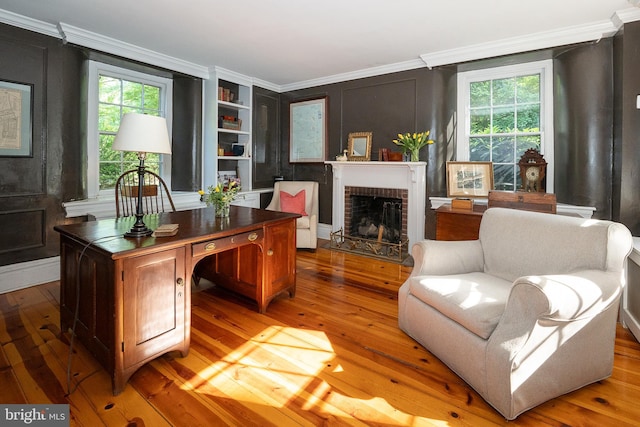 2 Earles Ln, Newtown Square, PA 19073 - office featuring plenty of natural light, wood-type flooring, a fireplace, ornamental molding, and a decorative wall