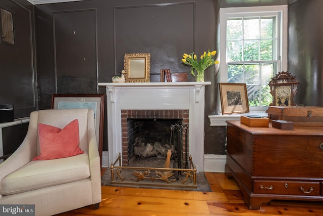 2 Earles Ln, Newtown Square, PA 19073 - living room with a brick fireplace and wood finished floors
