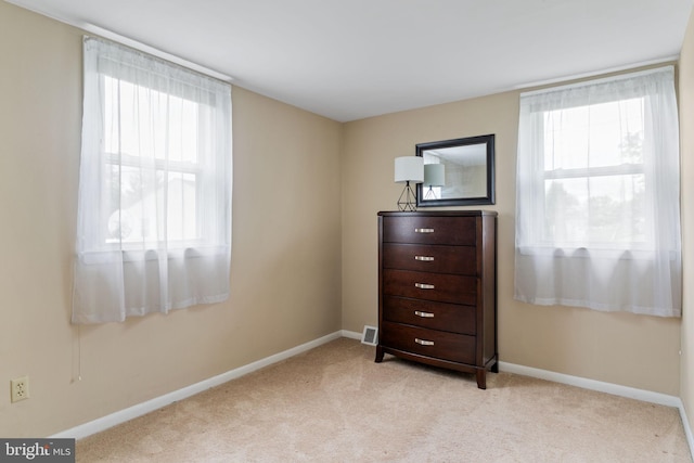 454 N Manor Dr, Media, PA 19063 - bedroom with carpet floors, baseboards, and multiple windows