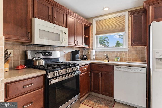 454 N Manor Dr, Media, PA 19063 - kitchen featuring white appliances, a sink, light countertops, decorative backsplash, and open shelves
