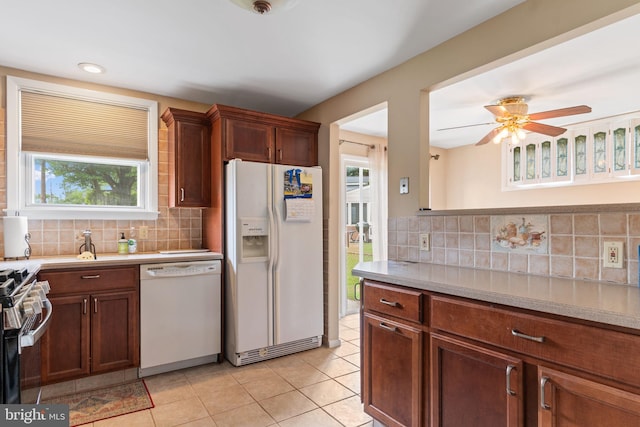 454 N Manor Dr, Media, PA 19063 - kitchen featuring white appliances, backsplash, light countertops, light tile patterned floors, and a ceiling fan
