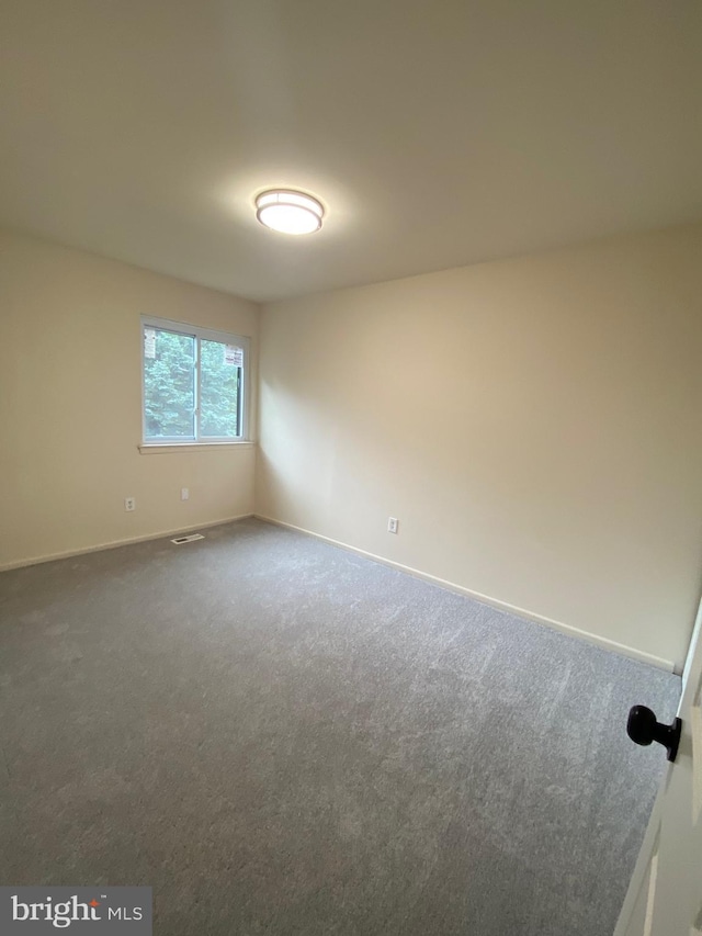 605 Bismark Way, King Of Prussia, PA 19406 - spare room with dark carpet and baseboards
