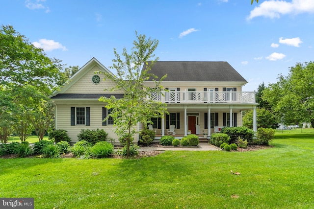 2550 Wellworth Way W, Friendship, MD 21794 - view of front facade with a porch, a front yard, and a balcony
