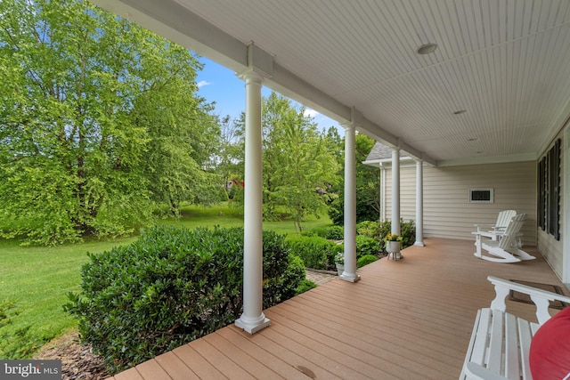 2550 Wellworth Way W, Friendship, MD 21794 - wooden deck with view of wooded area and a lawn