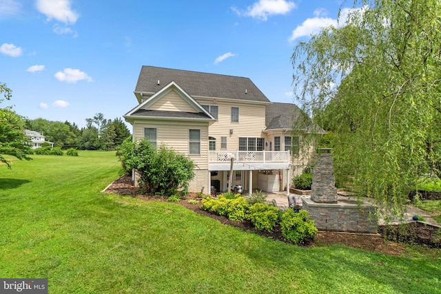 2550 Wellworth Way W, Friendship, MD 21794 - back of house with a yard, a patio, a wooden deck, and roof with shingles
