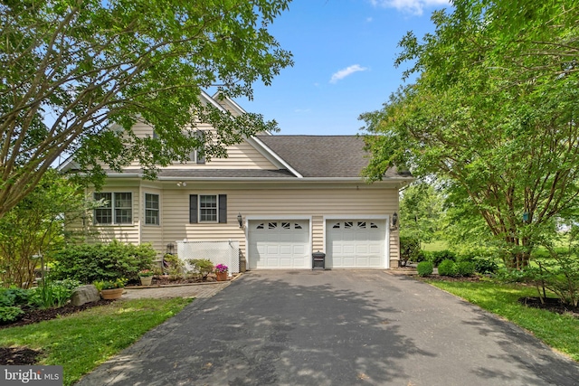 2550 Wellworth Way W, Friendship, MD 21794 - view of front of property with driveway, a garage, and roof with shingles
