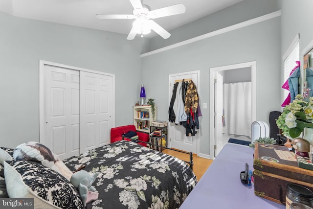 43433 Blair Park Sq, Ashburn, VA 20147 - bedroom featuring wood finished floors, a closet, a ceiling fan, and baseboards
