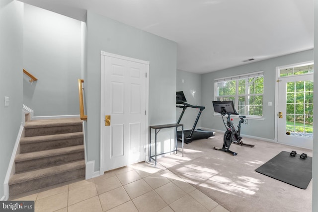 43433 Blair Park Sq, Ashburn, VA 20147 - workout area with baseboards and tile patterned flooring