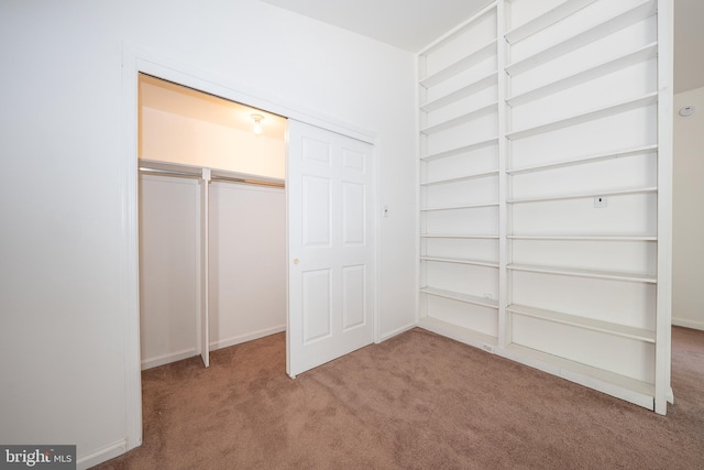 102 W Montgomery Ave Unit A, Ardmore, PA 19003 - unfurnished bedroom featuring carpet flooring and a closet