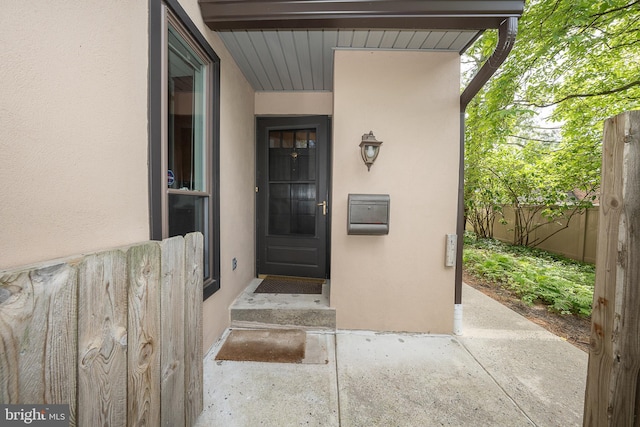102 W Montgomery Ave Unit A, Ardmore, PA 19003 - doorway to property featuring stucco siding