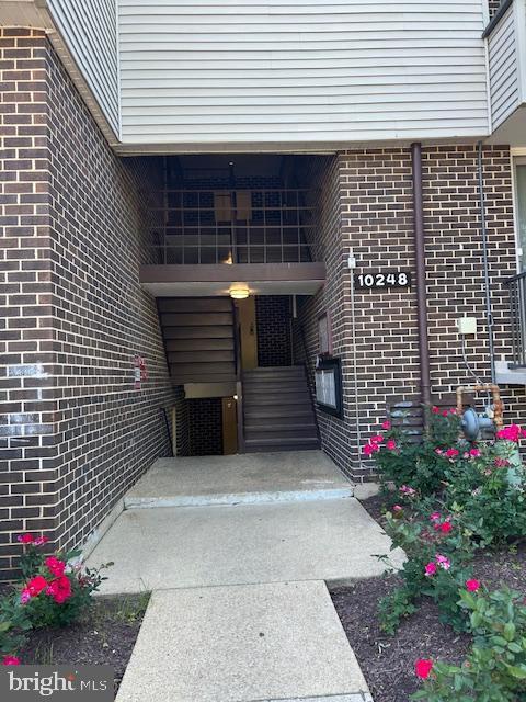 10248 Prince Pl Unit 23-102, Upper Marlboro, MD 20774 - entrance to property with brick siding