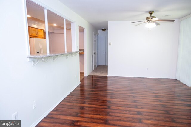 10248 Prince Pl Unit 23-102, Upper Marlboro, MD 20774 - unfurnished room with wood finished floors and a ceiling fan