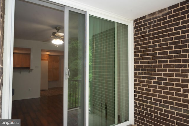 10248 Prince Pl Unit 23-102, Upper Marlboro, MD 20774 - property entrance featuring brick siding and a ceiling fan