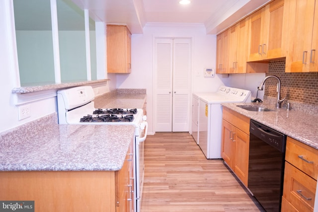 10248 Prince Pl Unit 23-102, Upper Marlboro, MD 20774 - kitchen with dishwasher, independent washer and dryer, gas range gas stove, ornamental molding, and light wood finished floors