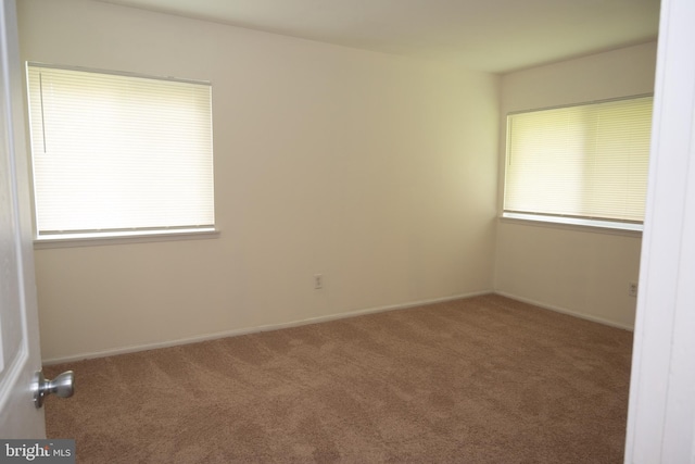 10248 Prince Pl Unit 23-102, Upper Marlboro, MD 20774 - carpeted spare room with healthy amount of natural light