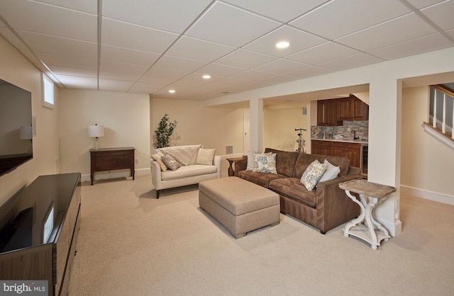 4953 Gloucester Dr, Doylestown, PA 18902 - living room with light carpet, recessed lighting, a drop ceiling, beverage cooler, and baseboards