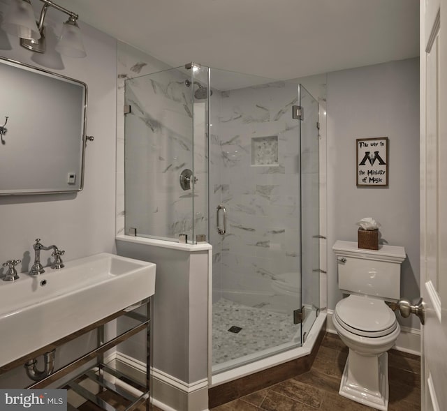 4953 Gloucester Dr, Doylestown, PA 18902 - full bathroom with toilet, a marble finish shower, baseboards, and a sink