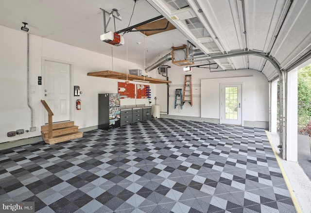 4953 Gloucester Dr, Doylestown, PA 18902 - garage featuring a garage door opener