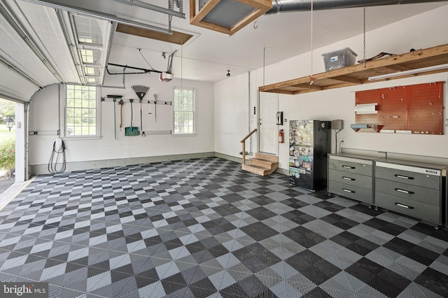 4953 Gloucester Dr, Doylestown, PA 18902 - garage featuring a garage door opener and baseboards