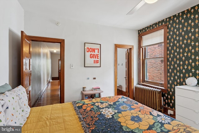 527 S 55th St, Philadelphia, PA 19143 - bedroom featuring radiator, wood finished floors, and ceiling fan