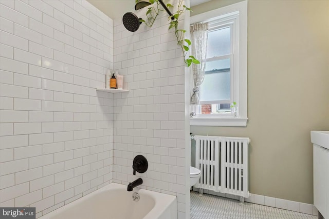 527 S 55th St, Philadelphia, PA 19143 - bathroom featuring radiator, toilet, bathing tub / shower combination, tile patterned floors, and baseboards
