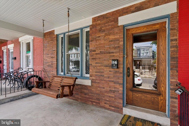 527 S 55th St, Philadelphia, PA 19143 - entrance to property featuring a porch and brick siding