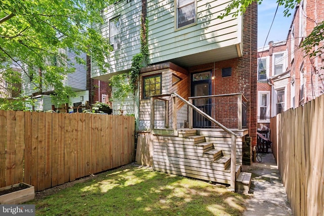 527 S 55th St, Philadelphia, PA 19143 - view of exterior entry featuring brick siding