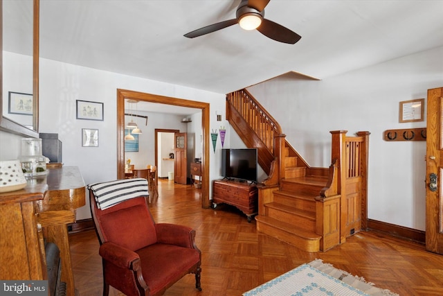 527 S 55th St, Philadelphia, PA 19143 - living area featuring stairway, a ceiling fan, and baseboards