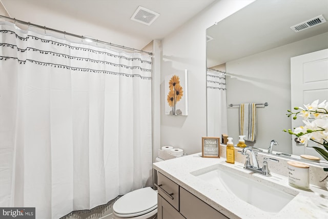 42023 Spring Air Dr, Brambleton, VA 20148 - full bath featuring toilet, vanity, and a shower with curtain