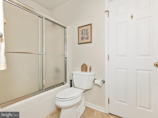 2807 Carlisle Dr Unit 29, New Windsor, MD 21776 - bathroom featuring toilet, shower / bath combination with glass door, baseboards, and tile patterned floors